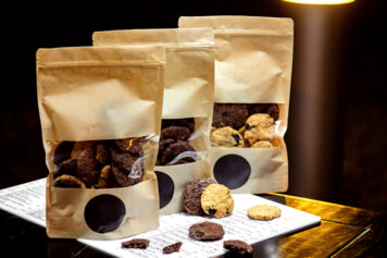 <a href="https://www.freepik.com/free-photo/black-white-cookies-package_7105180.htm#page=2&query=cookies-package&position=12&from_view=search&track=sph">Image by KamranAydinov</a> on Freepik